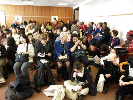 NGO-women debating in a small room