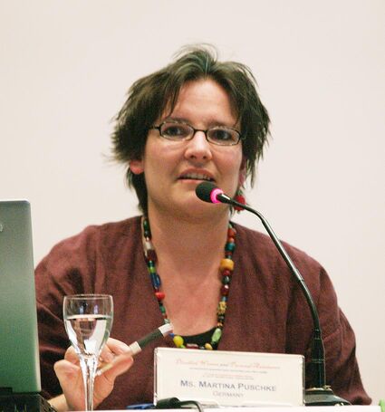 Martina Puschke giving a speech